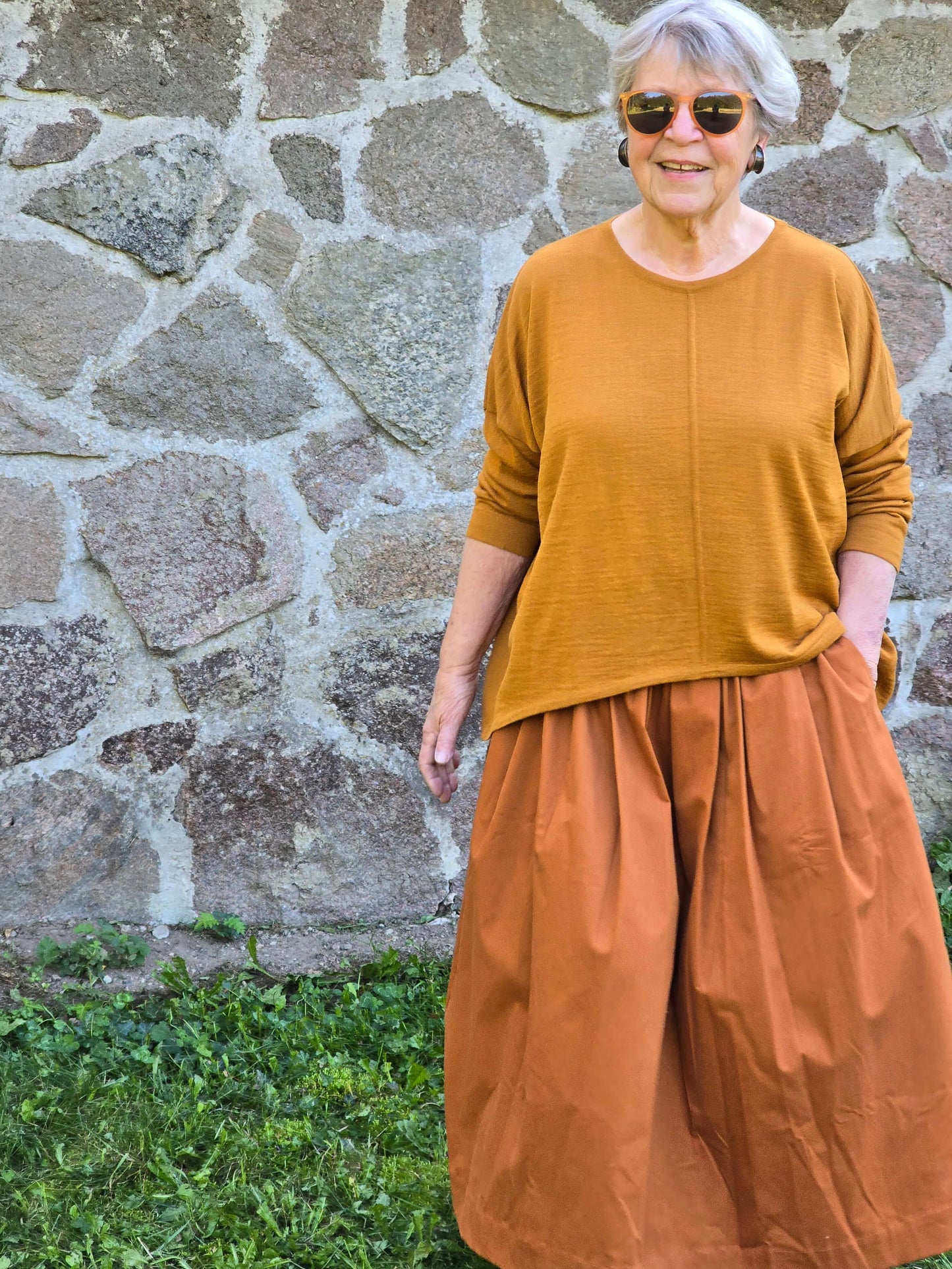 Elegant, kobberfarvet strik
