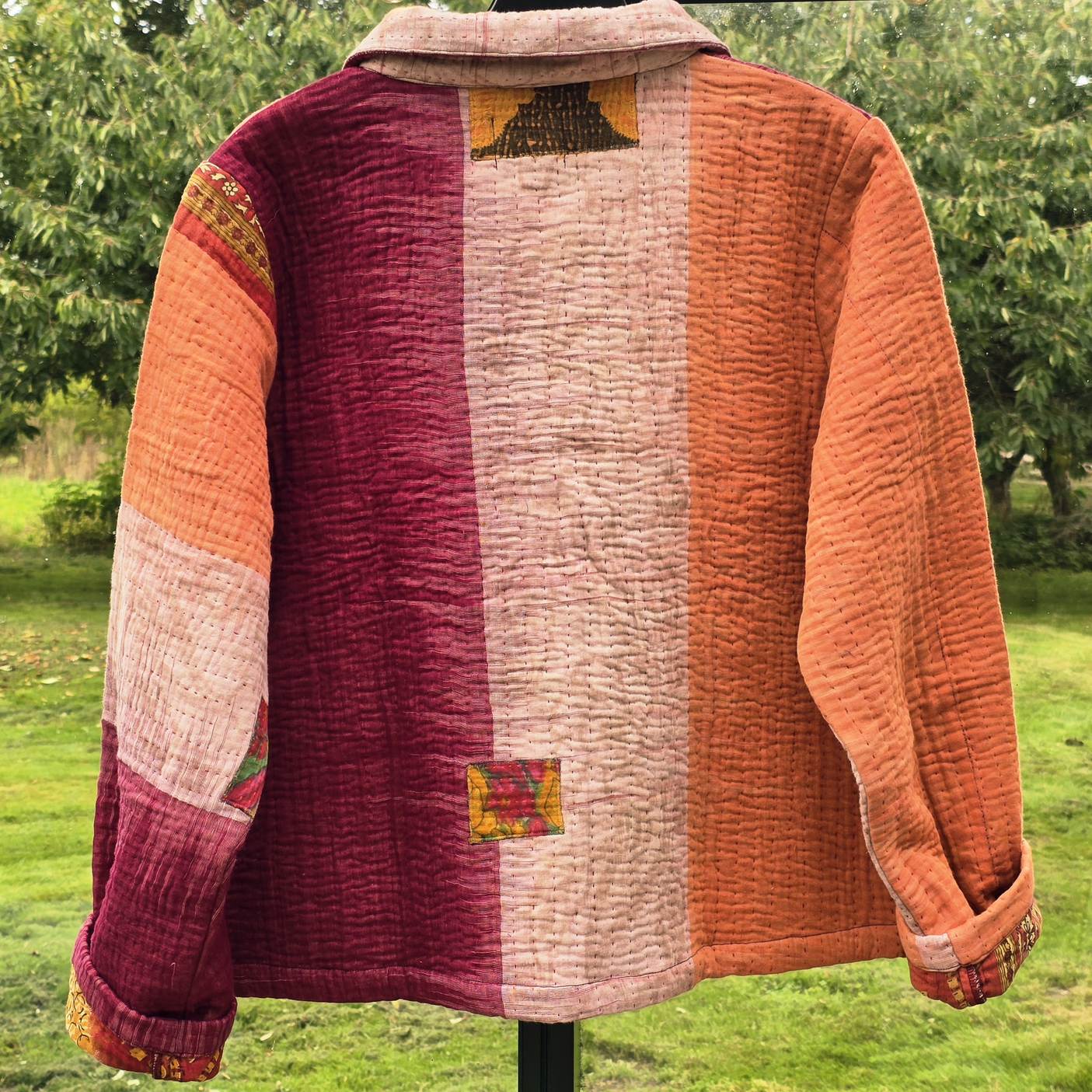 Rød/orange jakke, model Clara